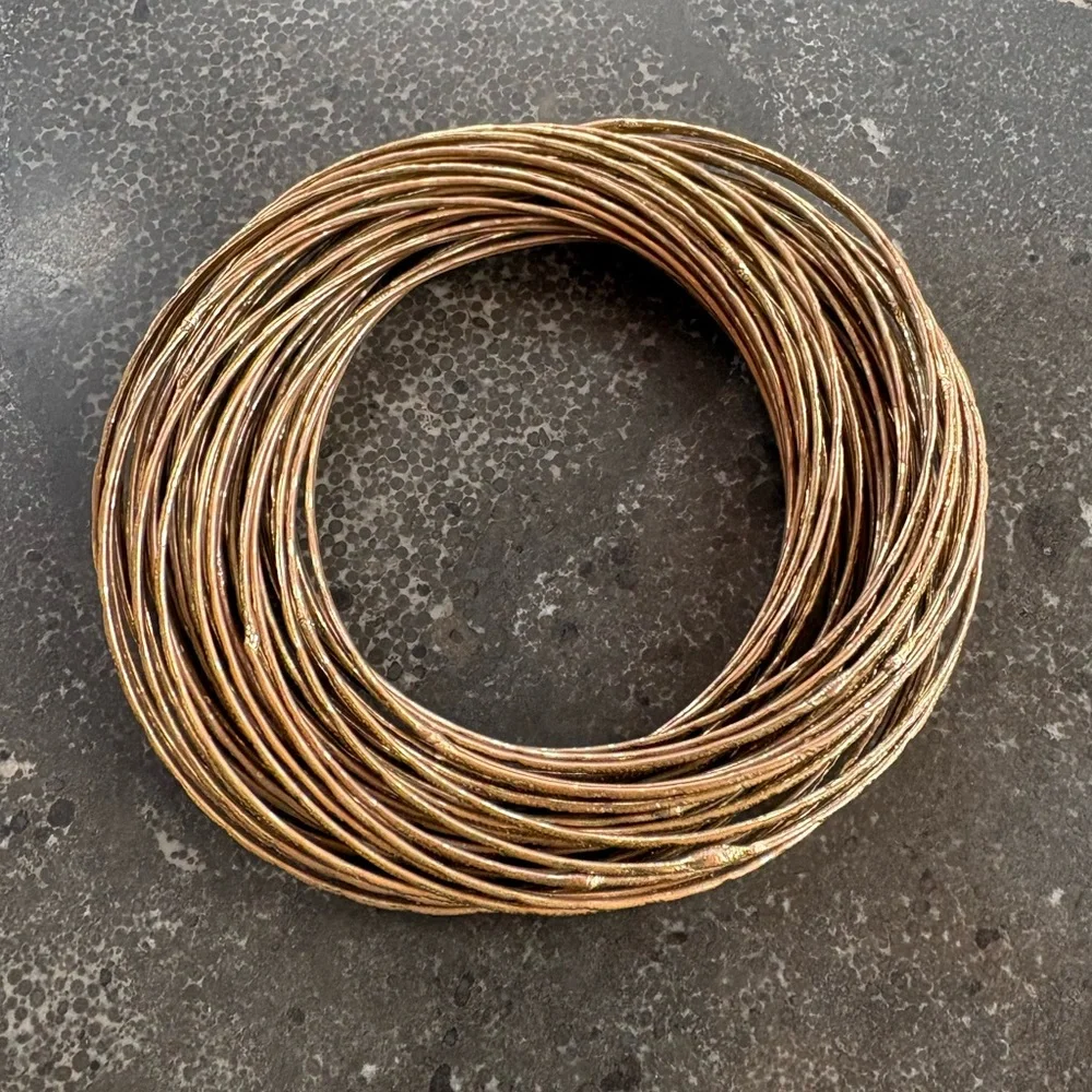Gold-Tone 43 Interlocking Bangle Bracelets - Picture 1 of 9